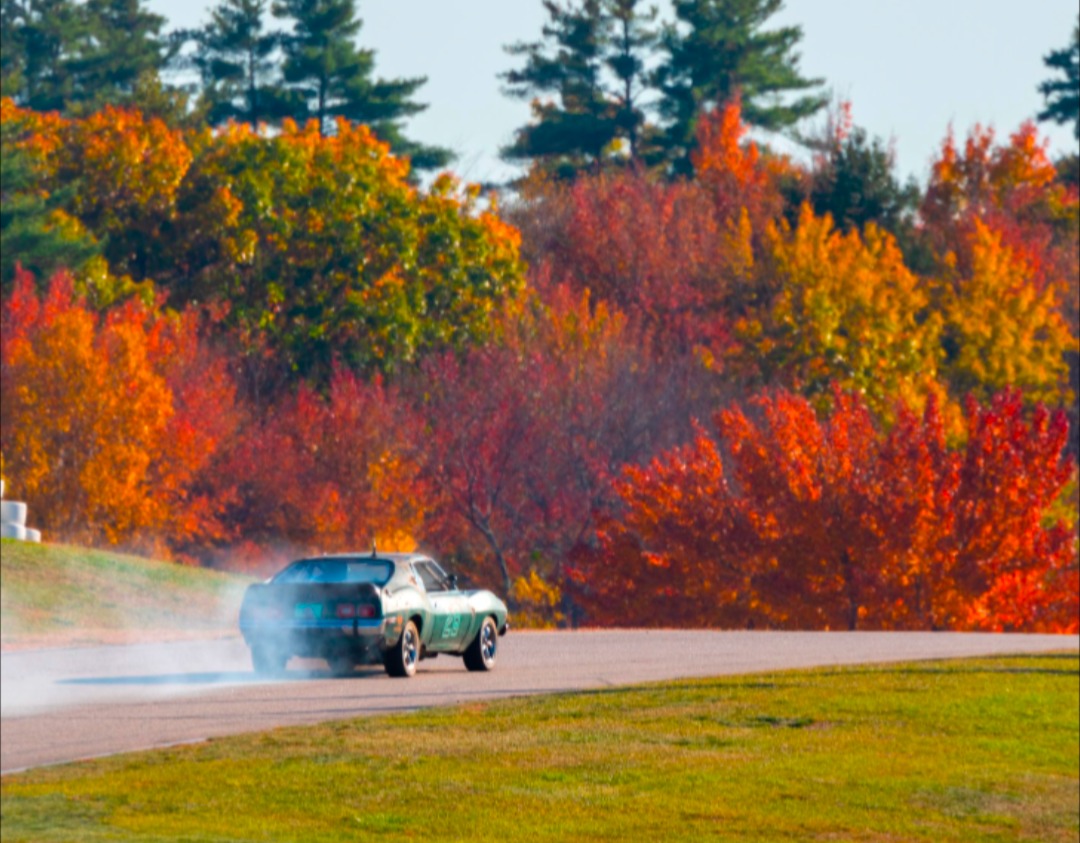 Race car on track in autumn